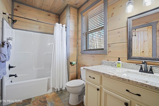 full bathroom with toilet, wood ceiling, tile patterned flooring, wooden walls, and vanity