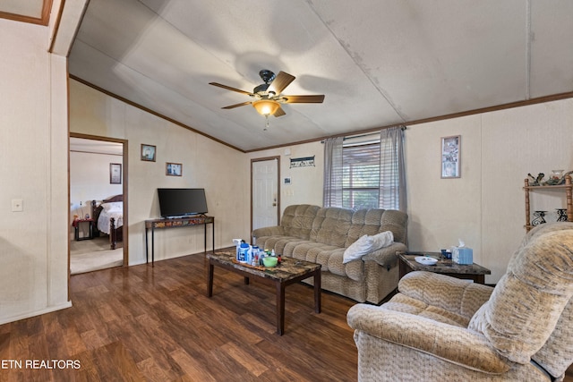 living room with ceiling fan, dark hardwood / wood-style floors, lofted ceiling, and ornamental molding