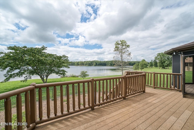 wooden terrace with a water view