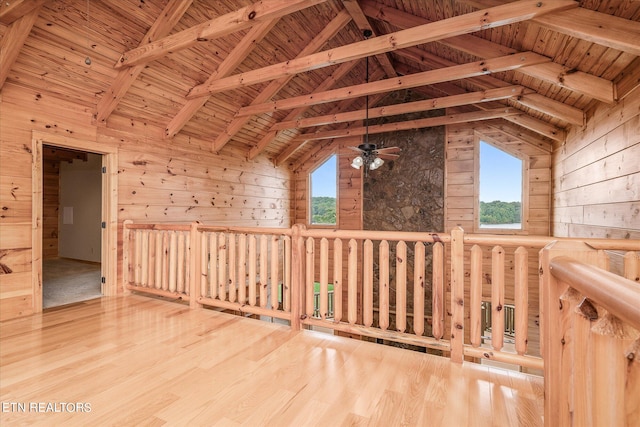 bonus room featuring a wealth of natural light, light hardwood / wood-style flooring, and wood ceiling