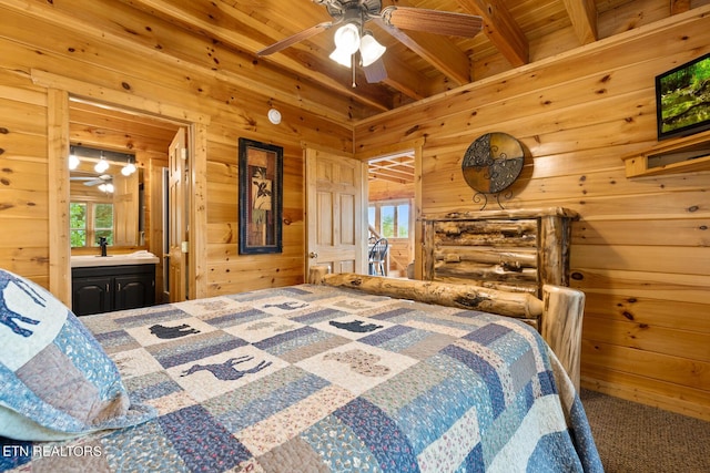 bedroom with multiple windows, wooden walls, and wood ceiling