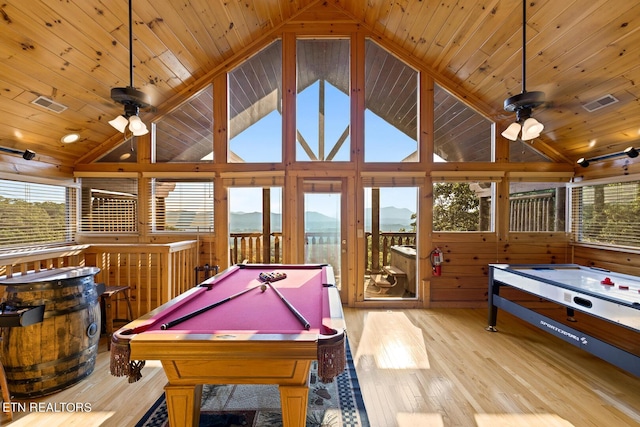 recreation room featuring billiards, a mountain view, a ceiling fan, and hardwood / wood-style flooring