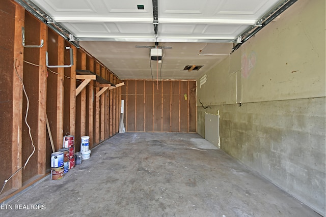 garage featuring a garage door opener