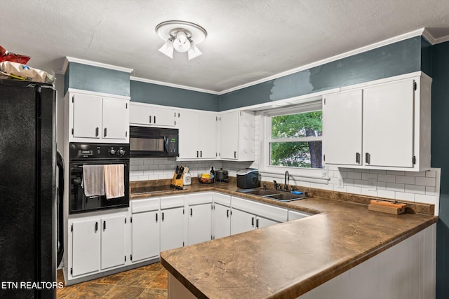 kitchen with tasteful backsplash, white cabinetry, black appliances, crown molding, and sink