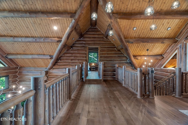 hallway featuring wooden ceiling, vaulted ceiling with beams, hardwood / wood-style flooring, and rustic walls