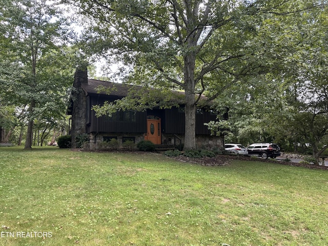 exterior space with a front lawn