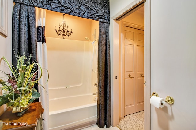 bathroom featuring shower / bathtub combination with curtain