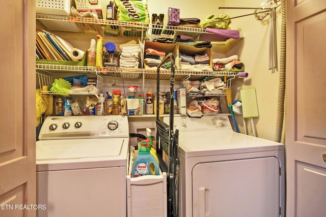 washroom with washer and clothes dryer