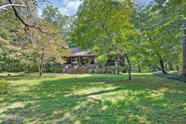 view of yard with a porch