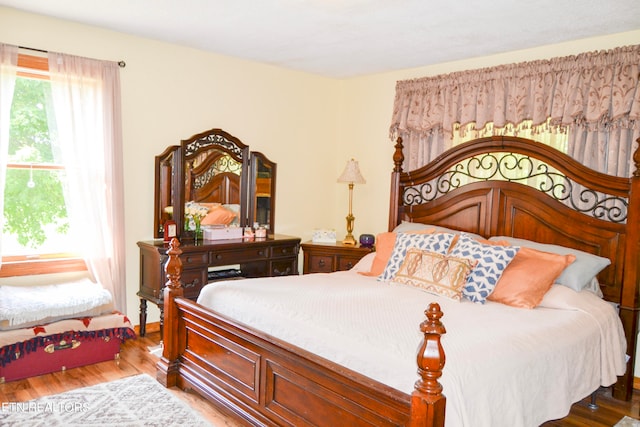 bedroom featuring hardwood / wood-style flooring