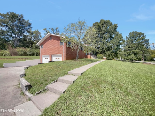 view of property exterior with a lawn and a garage