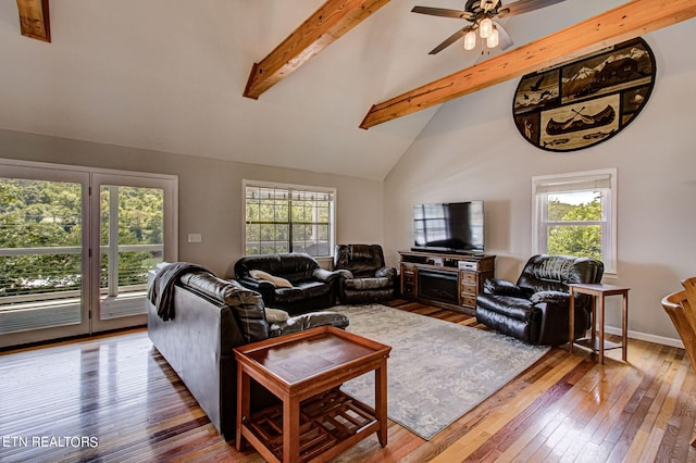 living room with high vaulted ceiling, ceiling fan, beamed ceiling, and wood-type flooring