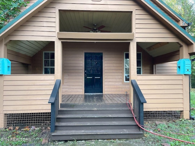 exterior space featuring a porch and a ceiling fan