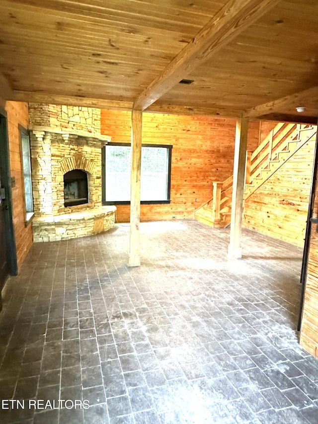 view of patio / terrace featuring a stone fireplace
