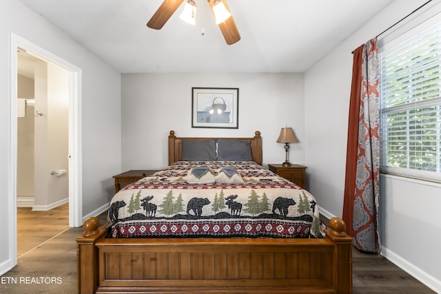 bedroom with hardwood / wood-style floors and ceiling fan