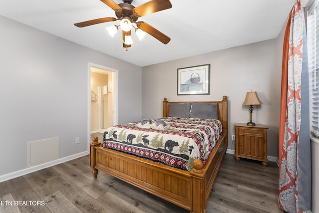 bedroom featuring connected bathroom, ceiling fan, and hardwood / wood-style flooring