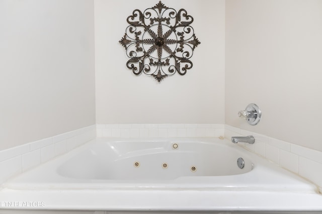 bathroom with a tub to relax in