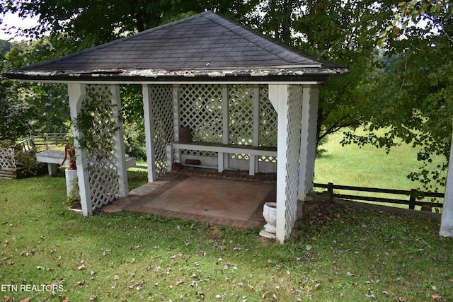 view of patio / terrace featuring a gazebo and fence