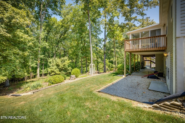 view of yard with a patio and a deck