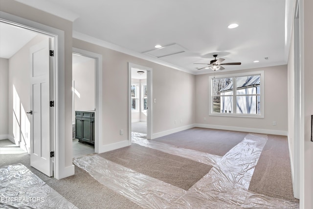 empty room featuring crown molding, baseboards, light colored carpet, recessed lighting, and a ceiling fan