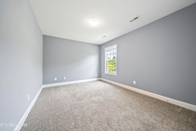 view of carpeted spare room