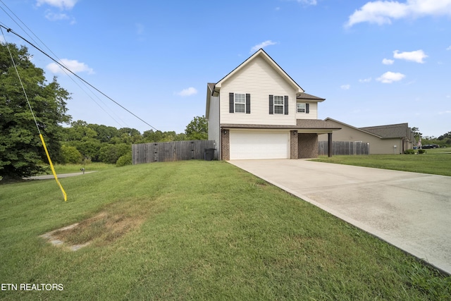 1505 Griffitts Blvd, Maryville, TN 37803 - traditional home with a front yard, concrete driveway, fence, an attached garage, and brick siding