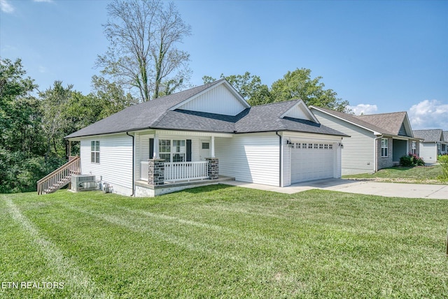 view of front of house featuring a porch, a garage, a shingled roof, driveway, and a front lawn