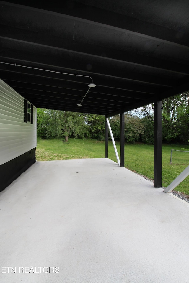 view of patio featuring a carport