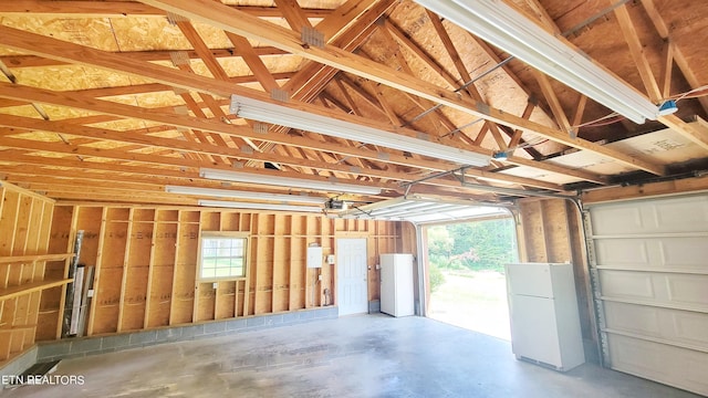 garage with white fridge