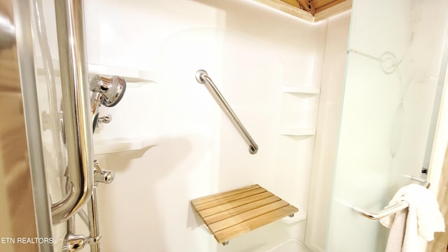 bathroom featuring walk in shower