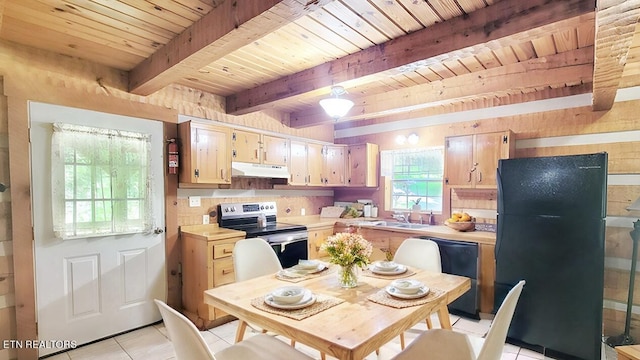 kitchen featuring decorative backsplash, wood ceiling, black appliances, beam ceiling, and light tile patterned flooring