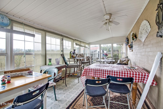 sunroom featuring wooden ceiling, lofted ceiling, and ceiling fan