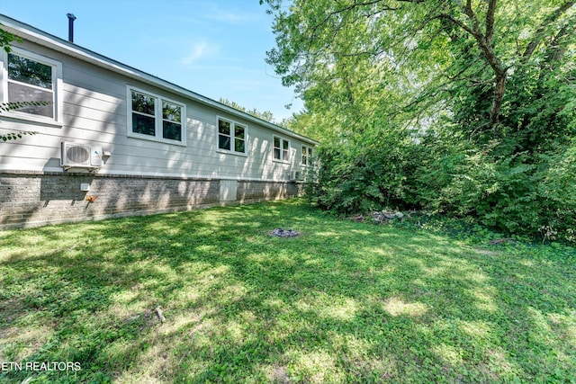 view of yard featuring ac unit