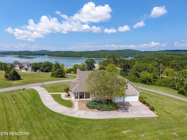 drone / aerial view with a water view