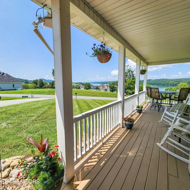 deck featuring a yard