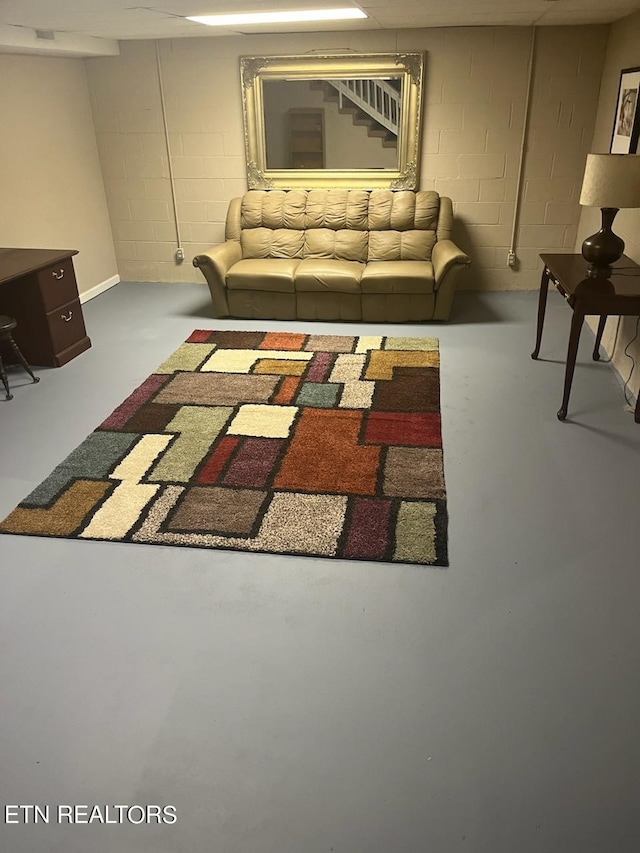 living room featuring concrete flooring