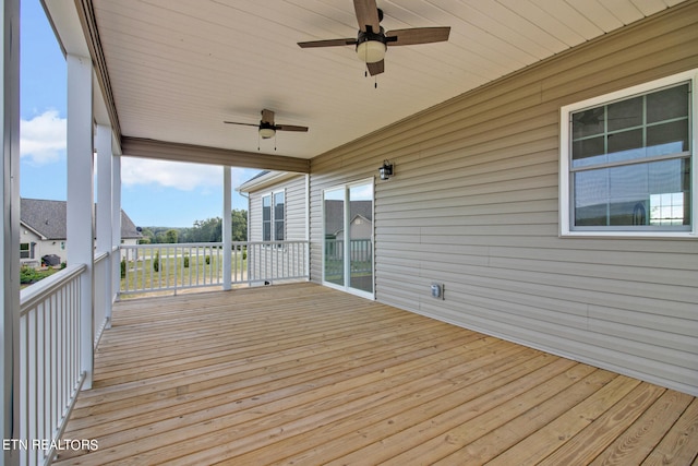 wooden terrace with ceiling fan