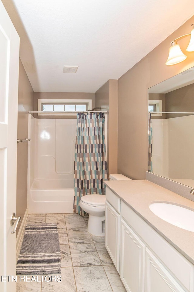 bathroom with toilet, visible vents, shower / tub combo with curtain, and vanity