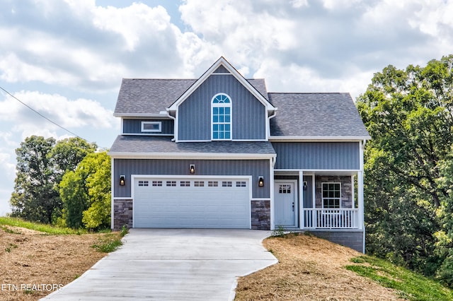 craftsman inspired home with a garage