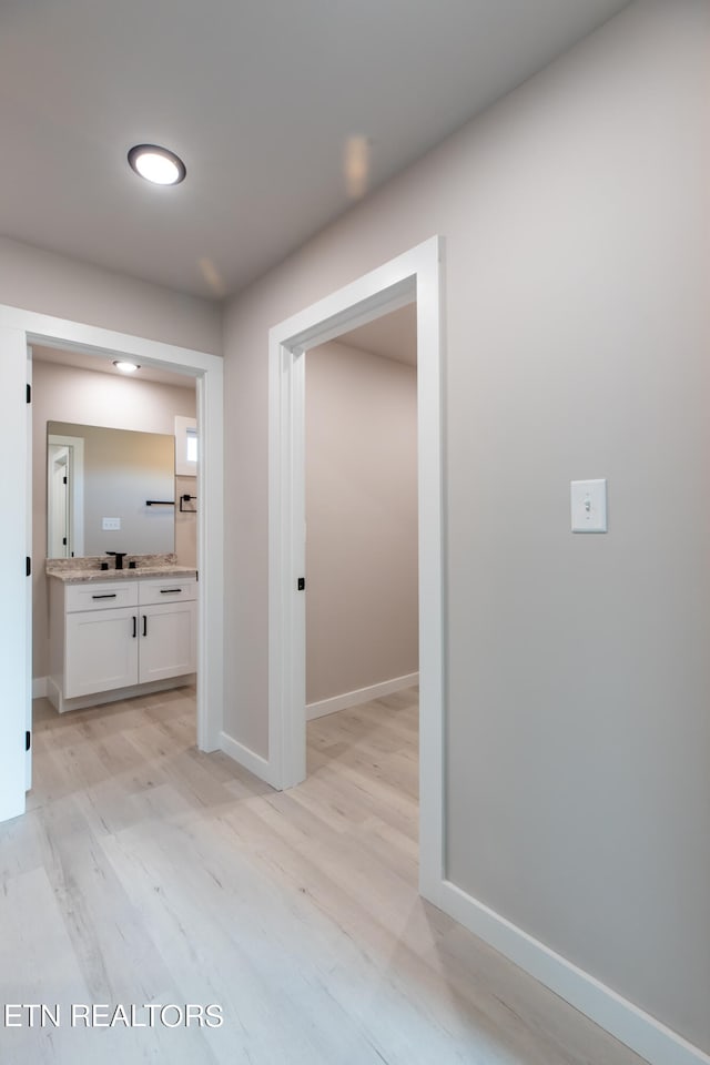 hall featuring light hardwood / wood-style floors