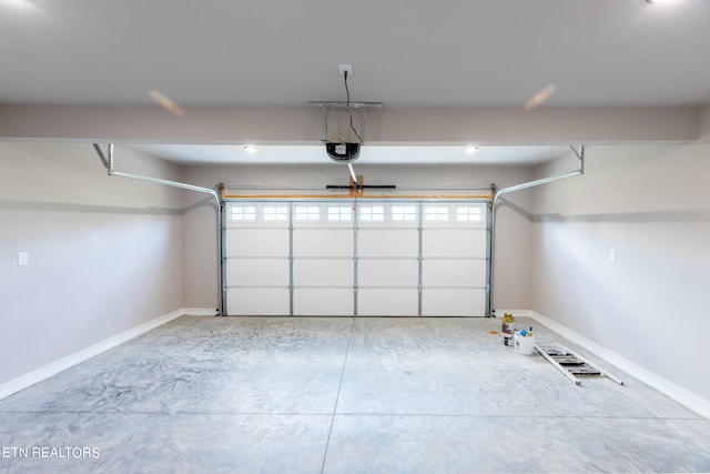 garage featuring a garage door opener