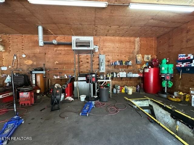 garage with a workshop area