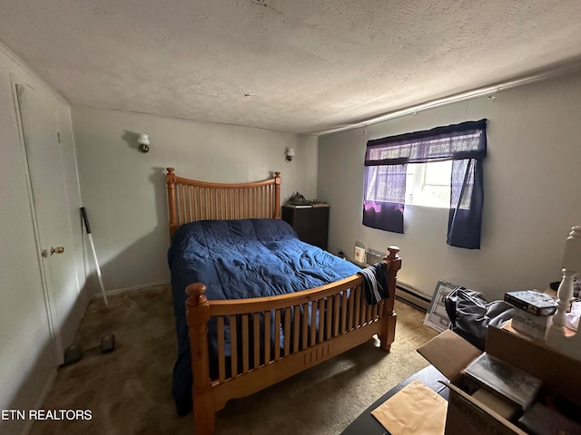 carpeted bedroom with a textured ceiling