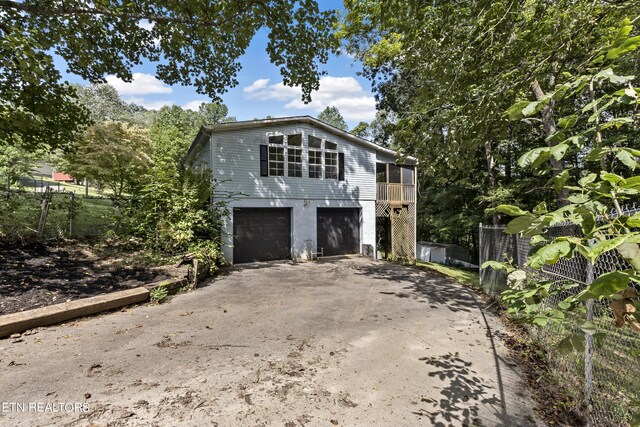 front of property featuring a garage