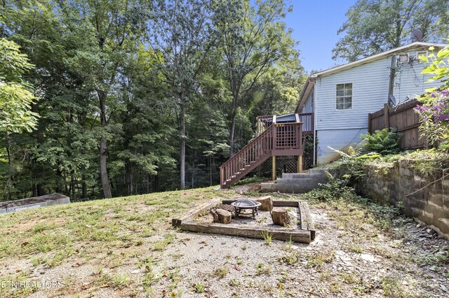 view of yard featuring a fire pit