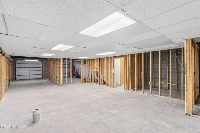 basement with a drop ceiling