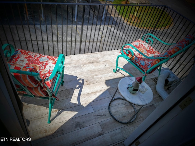 view of patio / terrace with a balcony