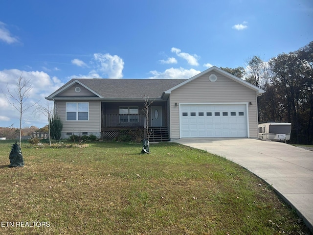 ranch-style house featuring a front yard, covered porch, and a garage