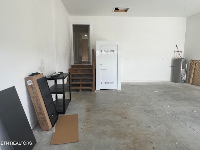 garage featuring water heater