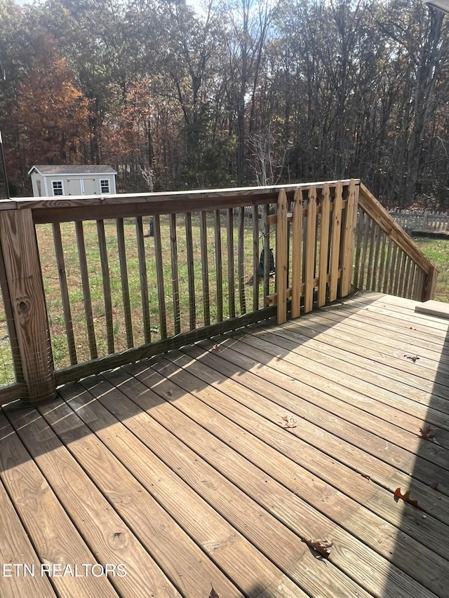 deck with a storage shed